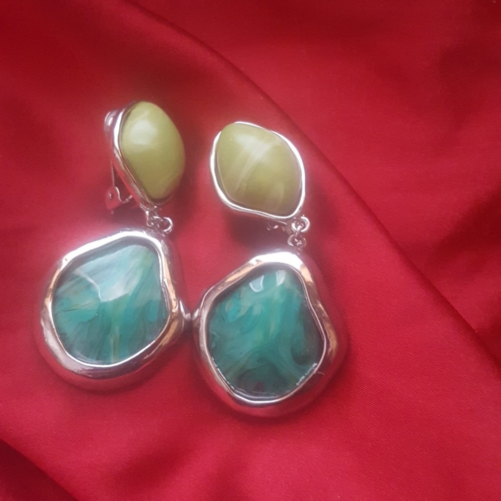 Green dangle clip earrings
